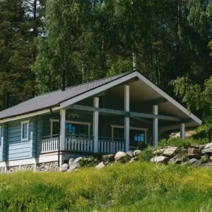 Дом (Синий, на берегу озера с видом на скалу) Forrest Lodge Karelia